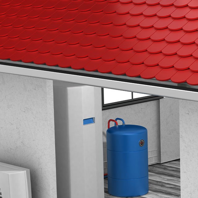 Darstellung einer Waermepumpe in einem Hausmodell